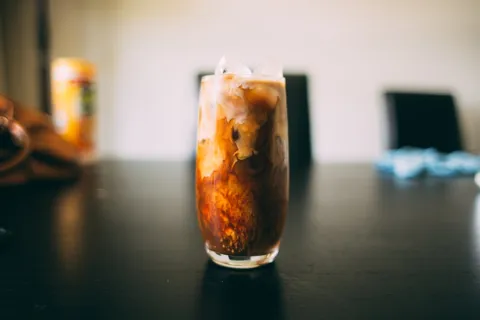Tall glass of iced soft drink